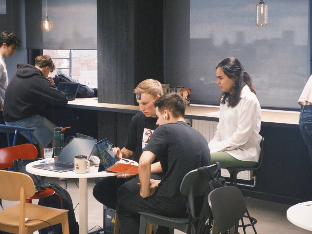 Teams heads-down building at a North Star hackathon