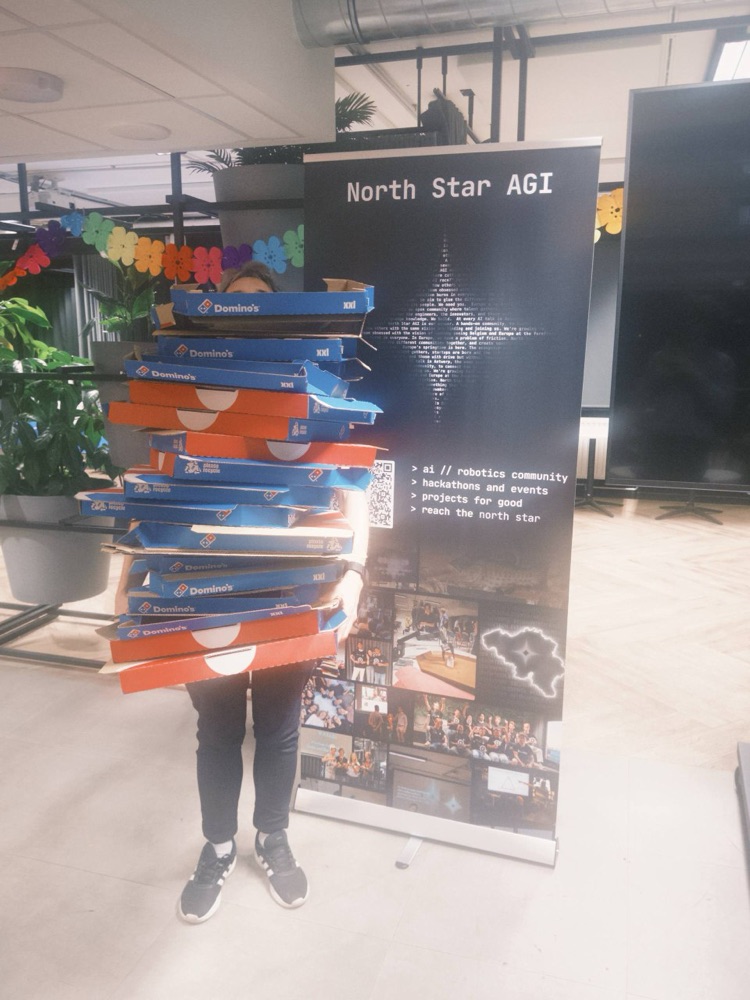 The pizza delivery arriving behind the North Star banner